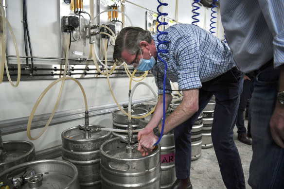 Ahead of the relaxation of COVID-19 restrictions in NSW, Premier Dominic Perrottet used his Sunday press announcement to visit the Marsden Brewhouse, owned by former Turnbull government minister Craig Laundy.