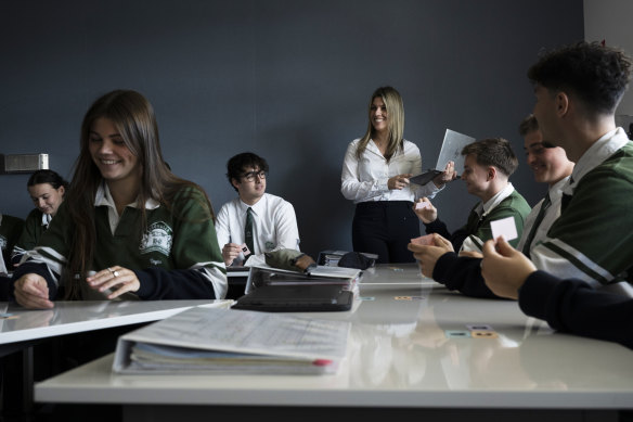 Cronulla High School teacher Paris Stasos with year 12 students.