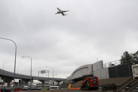 One of the new rail bridges, right, near the entrance to Sydney Airport’s domestic terminal.