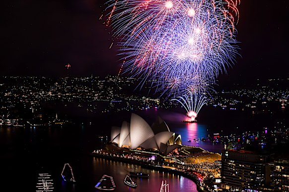 Fireworks exploding over Sydney Opera House on New Year’s Eve 2025.