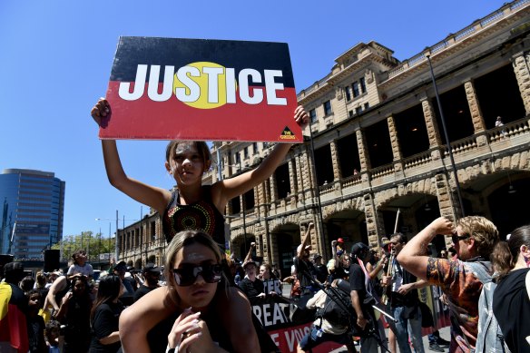 Invasion Day Rally protesters gathered at Belmore Park near Central Railway Station on Thursday morning. 