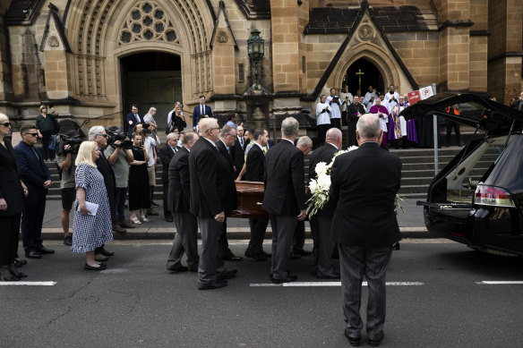 Cardinal George Pell’s coffin is carried into St Mary’s Cathedral.