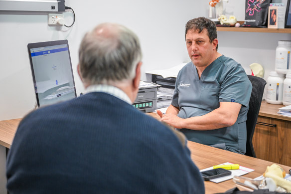 Orthopaedic surgeon Ilan Freedman (right) saves 90 minutes a day using AI at his clinic in Melbourne’s south-east.