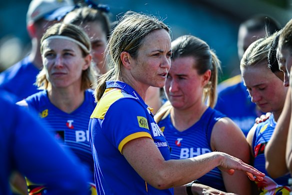 Daisy Pearce addresses her players during a break of their round-nine clash with the Power.
