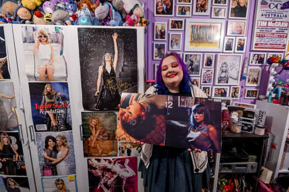 Some fans, including Morgan De La Rue, express their devotion to Swift by collecting as much merchandise as possible. 