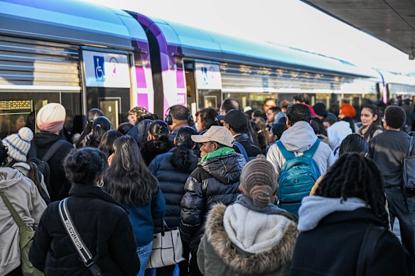 Commuters waiting to board a V/Line service at Tarneit.