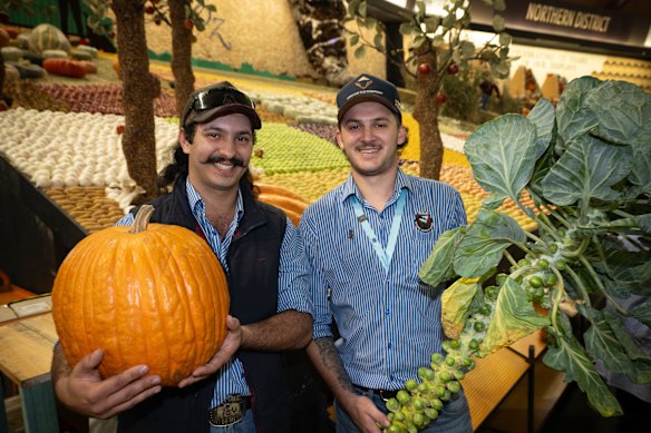  Luke Alexandrou and James Leys are the fourth generation in their family to contribute to the Western District display at the Royal Easter Show. 