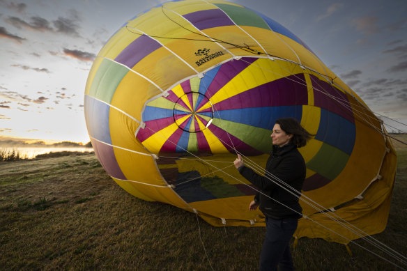 Hot air balloon pilot Nicola Scaife prepares for her last practice flight in the Hunter Valley before the championships next week.