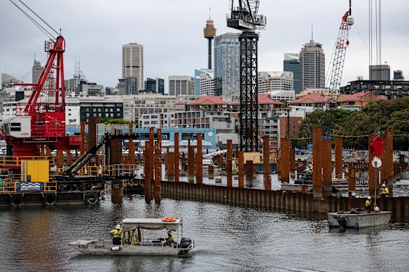 Multiple vessels plied the confined waterway of Blackwattle Bay during construction.