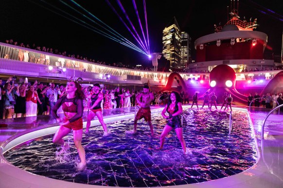 Ship-wide party Scarlet Night comes to life on the pool deck.