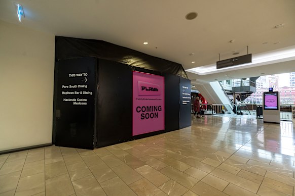 Half of Southgate’s first-floor shop lots sit empty behind boards. 
