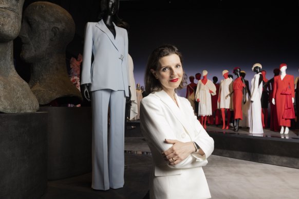Politician Allegra Spender, federal member for Wentworth, stands by her Carla Zampatti jacket, which she wore on the campaign trail, at an exhibition devoted to her late mother’s designs at the Powerhouse.
