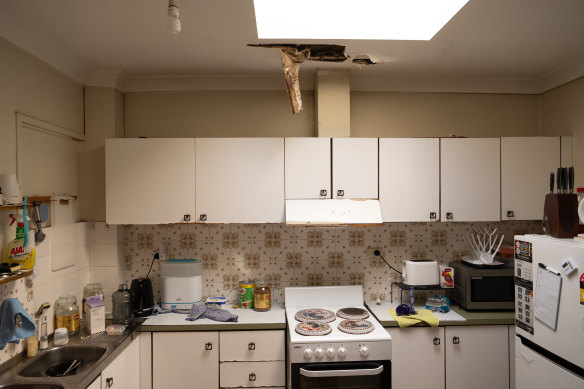 The collapsed ceiling above the stove in Sarah’s rental flat.