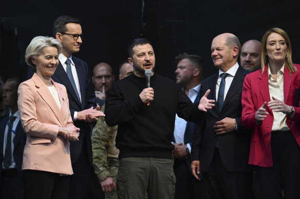 Zelensky, centre, talks to the crowd in Aachen on Sunday.