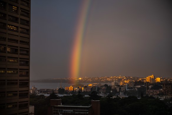 A rainbow forms over Garden Island after several days of wet weather in Sydney.