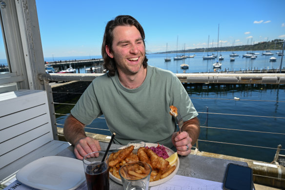 Jimmy Rees tucks into his plate of fish and chips at The Rocks Mornington.