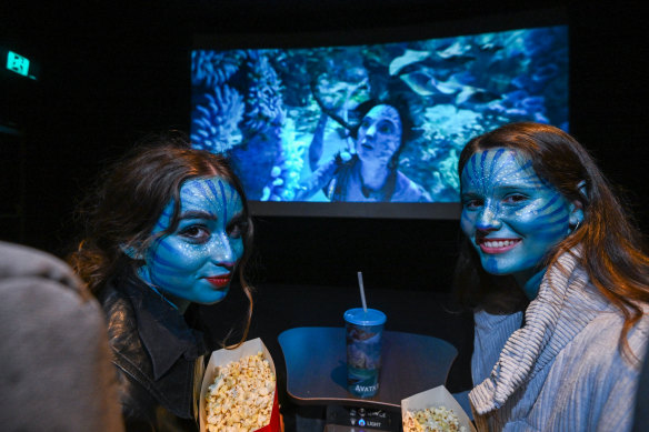 Avatar fans (left) Jemima and Maddy at Hoyts Melbourne Central in full Na’vi face paint for a preview screening of Avatar: The Way of Water.