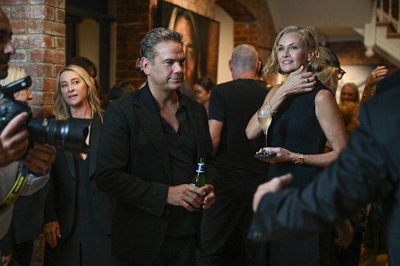 Lachlan and Sarah Murdoch out and about in Melbourne in 2025.