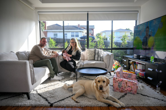 Damien Bean and wife Natalie with daughter Sienna have moved from an inner-city apartment to a town house in Burwood.