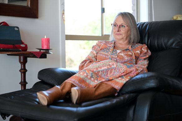 Jenny Prowse relaxes in her living room in Paynesville.