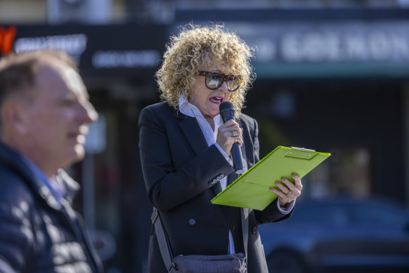 Stop the Elsternwick Towers spokesperson Kathy Deacon addresses the rally in Elsternwick.  