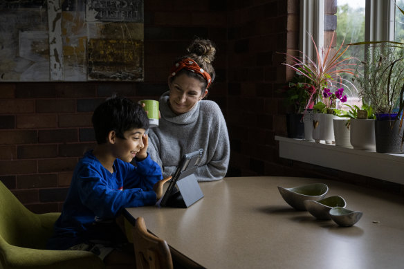 Loz Booth with her son.