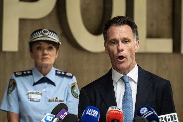 Premier Chris Minns and Police Commissioner Karen Webb speak on Thursday. 
