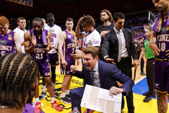 Kings coach Chase Buford talks to his players in the semi-final series against the Hawks.