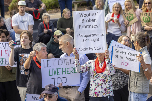 An anti-Woolworths development demonstrator confronts a YIMBY heckler at a community rally in Elsternwick. 