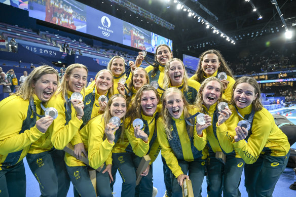 The Stingers with their silver medals.