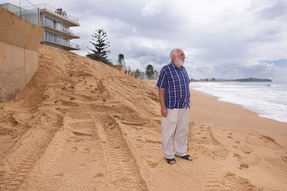 Coastal engineer Angus Gordon stands on Collaroy beach. 