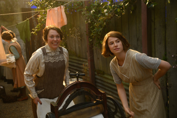 Colman with Jessie Buckley, who plays Rose Gooding, the woman accused of sending the offensive letters. 