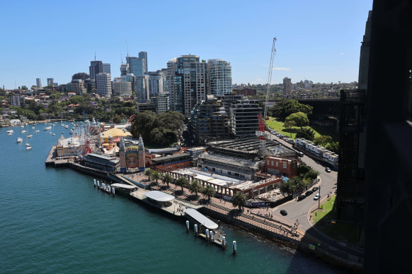 The famous pool opened on a prime slice of waterfront land next to the Harbour Bridge in 1936. 