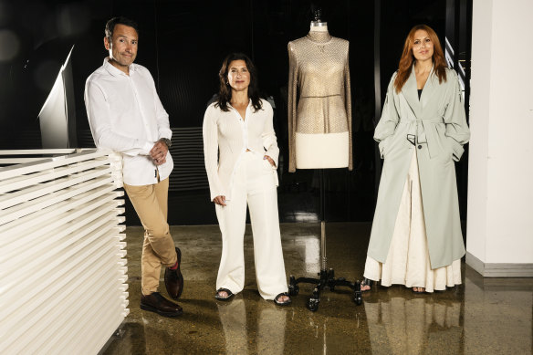 Fashion forward ... Cue’s Justin and Melanie Levis (centre) with IMG’s Natalie Xenita. The brand is staging its first solo show at Australian Fashion Week.