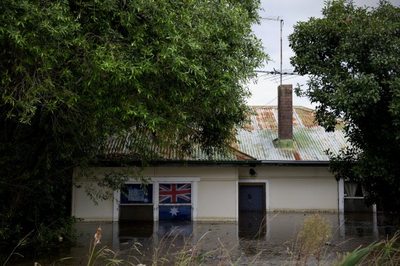 A home is inundated by floodwaters along the Hawkesbury River.