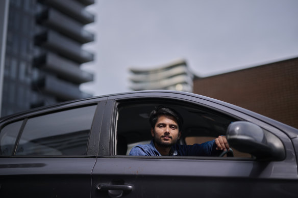 Uber driver Nabin Adhikari will be working across Easter, but isn’t likely to make minimum wage. 