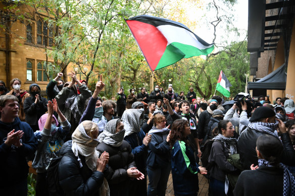 Students rally at the Pro-Palestine encampment at the University of Melbourne on Friday.