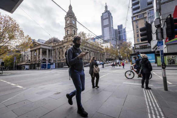 The number of pedestrians was down by almost half in some of the busiest parts of the city as new restrictions took effect.