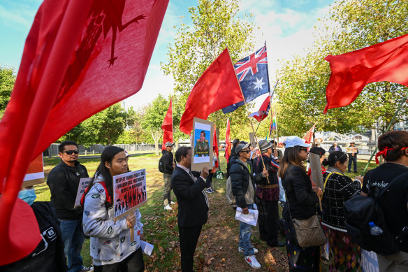 Protesters from Mynamar and Cambodia outside the ASEAN summit in Melbourne on Monday.