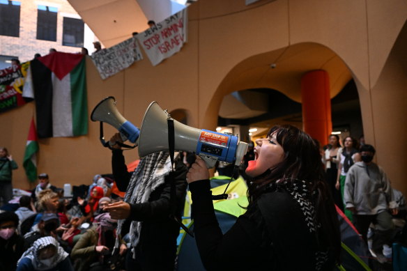 A group of students occupy the Arts West building at Melbourne University’s Parkville campus on Wednesday.