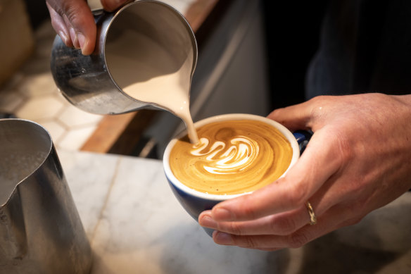 A magic coffee is poured at Bowery to Williamsburg cafe.