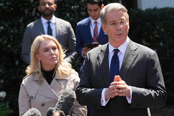 Treasury Secretary Scott Besent and White House Press Secretary Karoline Leavitt speaking to reporters outside the West Wing.