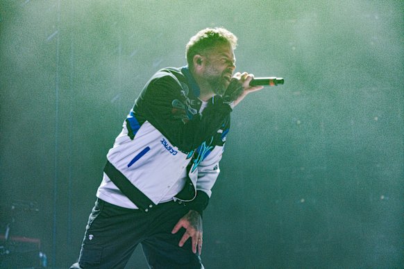 Scott Robinson performs on stage at Rod Laver Arena.