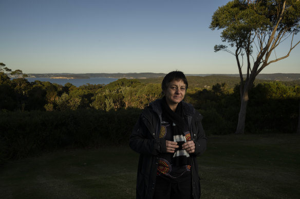 Tracey Howie standing on Tony Denny’s property, directly in front of the site for the proposed Optus tower.