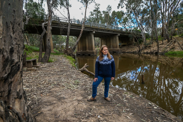 Tracie Kyne at the Campaspe River, which burst its banks and flooded Rochester in October.