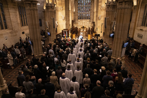 Parishioners gather at St Andrew’s Cathedral in Sydney on Friday night. 