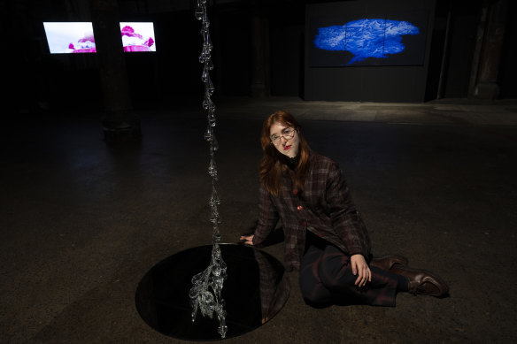 Anna May Kirk with her glass piece, Whale Fall, highly commended in the Valerie Taylor Art Prize. 