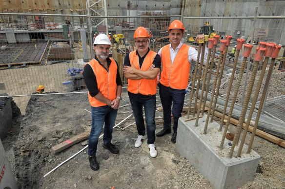 Sam Kassis and Romio Georges of Kassis Homes and broker Joe Khoury at the site of one of the first apartment developments to have defect insurance in two decades.