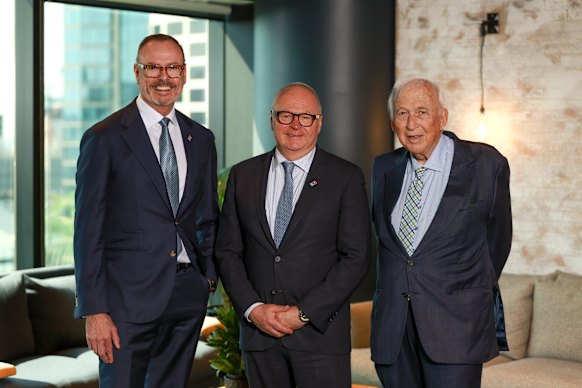 Domino’s Pizza’s Mark van Dyck (centre), former CEO Don Meij (left) and chairman Jack Cowin (right).