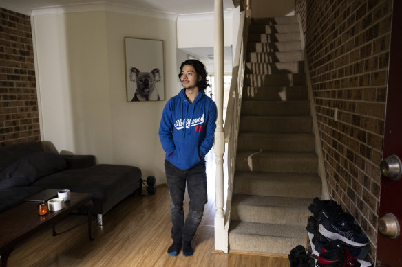 Trent Foo, 23, at his rental in Glebe.